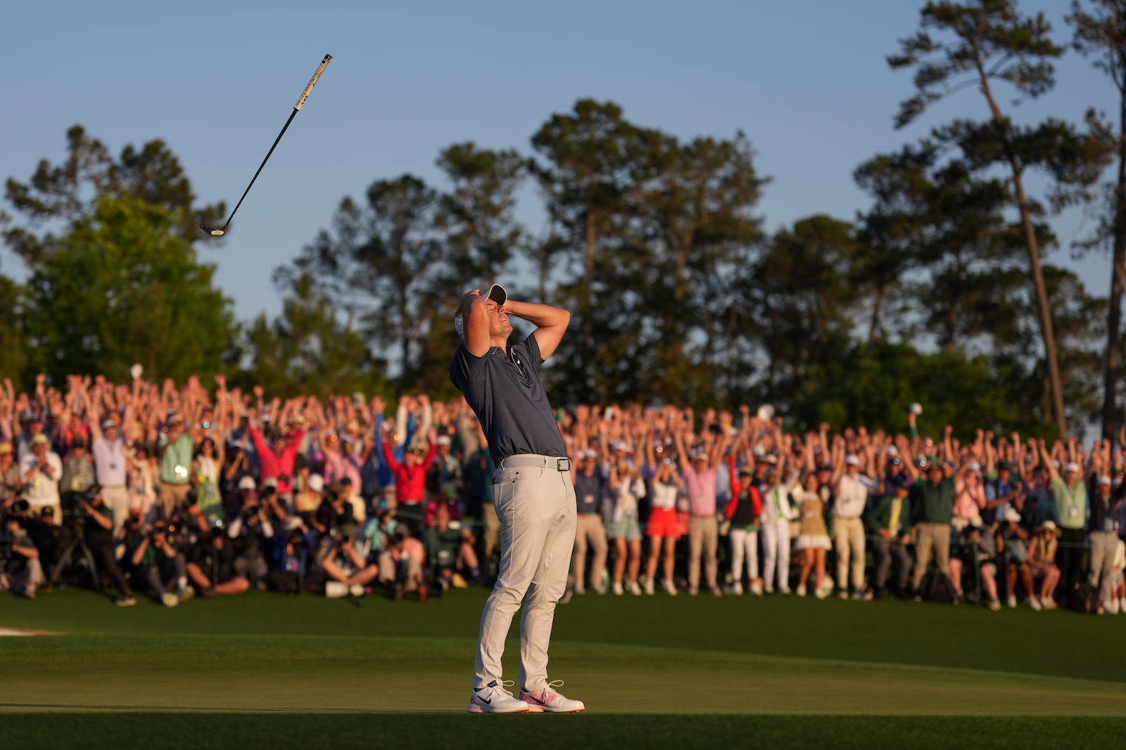 Rory McIlroy, of Northern Ireland, reacts after winning in a playoff against Justin Rose after the final round at the Masters golf tournament, Sunday, April 13, 2025, in Augusta, Ga. (AP Photo/Matt Slocum)