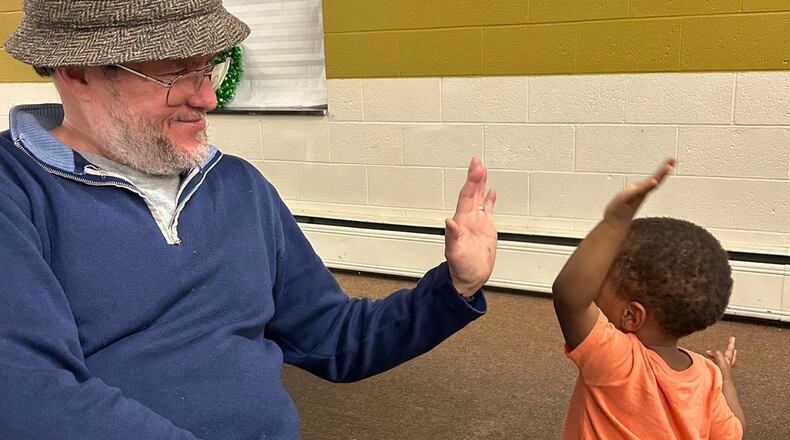 Springfield Promise Neighborhood events, including the upcoming Christmas Store bring together community members helping people in need. CONTRIBUTED PHOTO