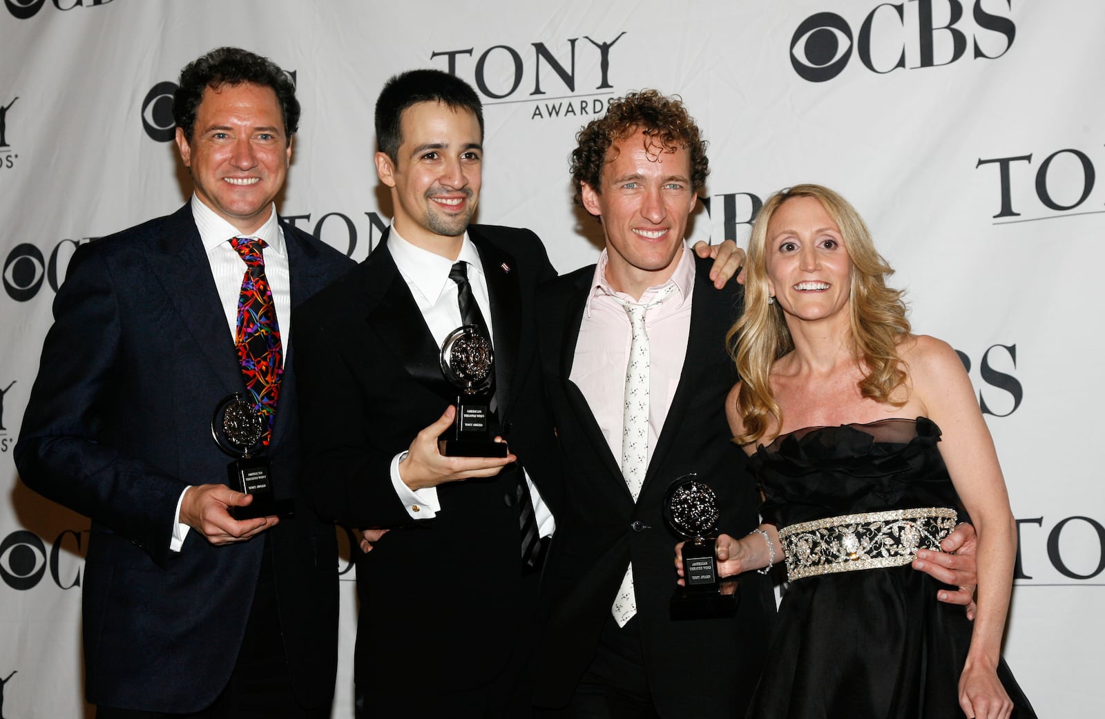 FILE - Producer Kevin McCollum, from left, actor Lin-Manuel Miranda, producer Jeffrey Seller and producer Jill Furman pose backstage with their Tony Award for best musical "In the Heights," in New York, on June 15, 2008. (AP Photo/Stuart Ramson, File)