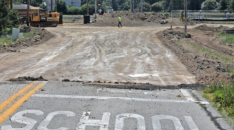 The new roundabout being constructed at the intersection of Selma Pike and Possum Road near Shawnee Schools. BILL LACKEY/STAFF