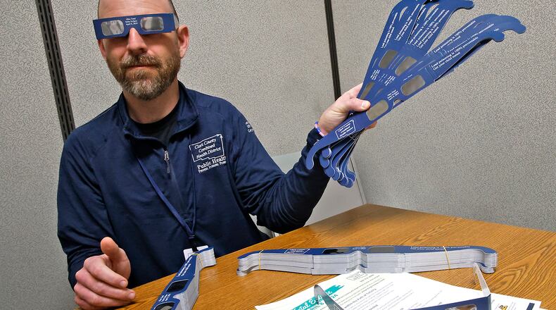 Nate Smith, from the Clark County Combined Health District, wanted everyone to know that the health district has special eclipse glasses that will allow people to view the eclipse safely. They also have literature about viewing the eclipse. BILL LACKEY/STAFF