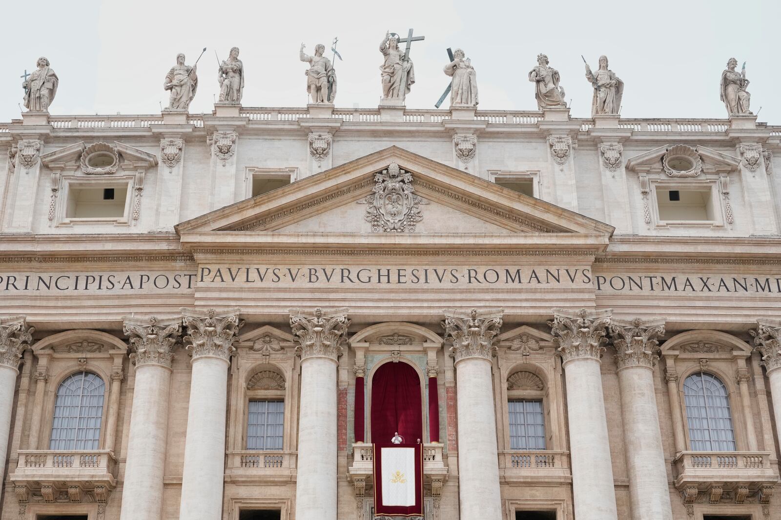 Pope Leo XIV appears at the central balcony of St. Peter's Basilica for his first Sunday blessing after his election, in St. Peter's Square at the Vatican, Sunday, May 11, 2025.(AP Photo/Gregorio Borgia)