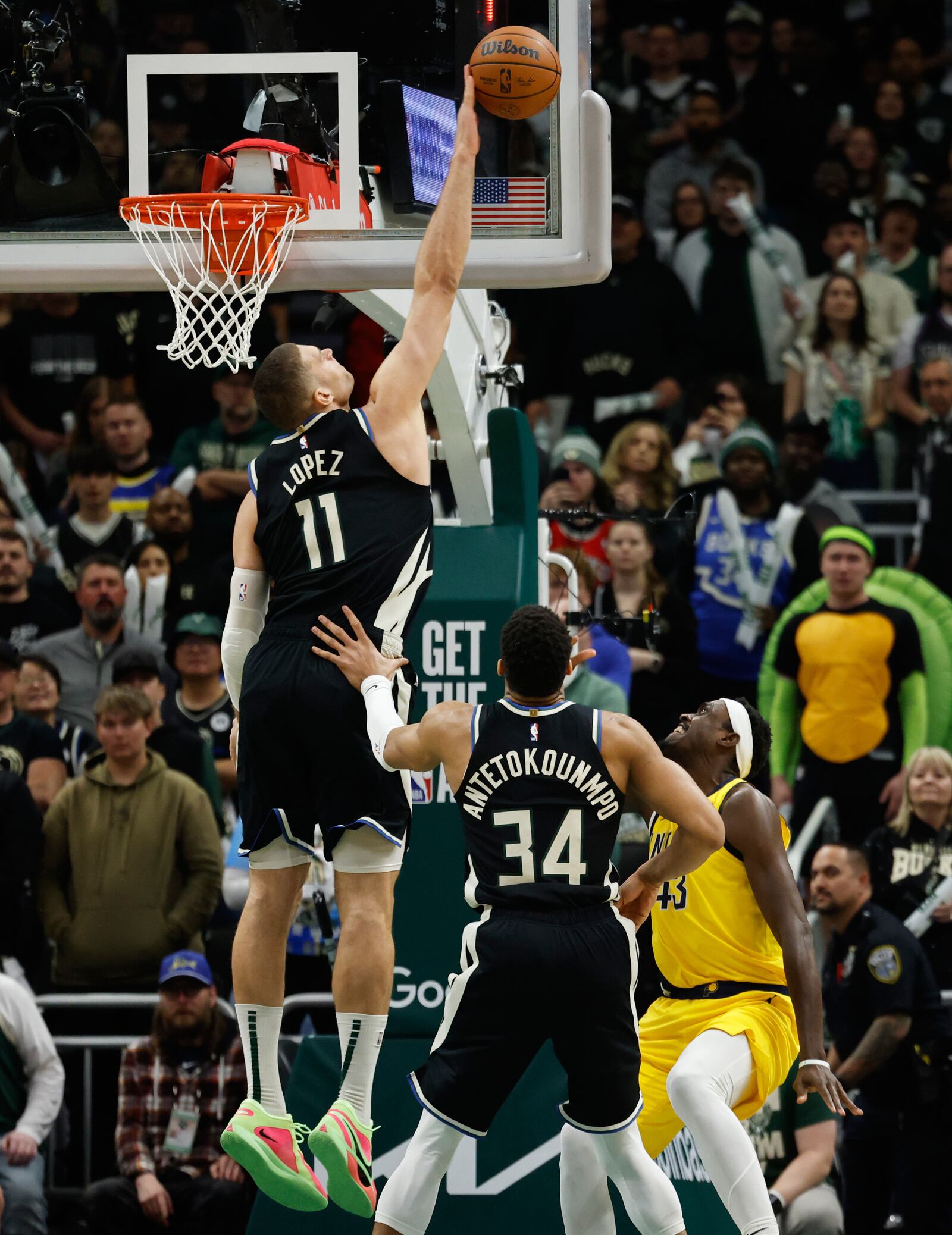 Milwaukee Bucks' Brook Lopez (11) blocks the shot by Indiana Pacers' Pascal Siakam during the first half of Game 4 of a first-round NBA basketball playoff series Sunday, April 27, 2025, in Milwaukee. (AP Photo/Jeffrey Phelps)
