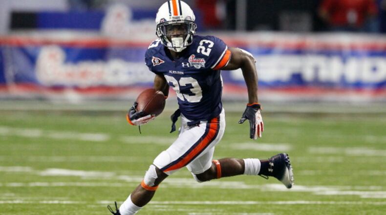 ATLANTA, GA - DECEMBER 31: Onterio McCalebb #23 of the Auburn Tigers against the Virginia Cavaliers during the 2011 Chick Fil-A Bowl at Georgia Dome on December 31, 2011 in Atlanta, Georgia. (Photo by Kevin C. Cox/Getty Images)