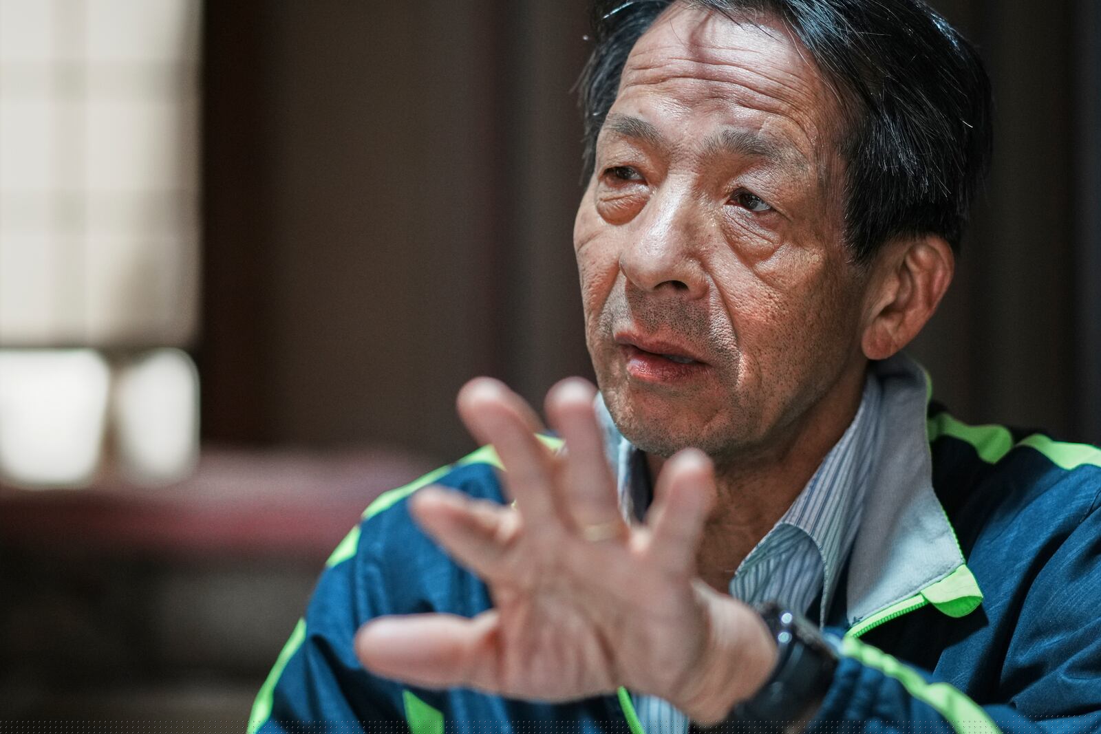 Masatsugu Tanimoto, a farmer and a community leader who is one of only hundreds of so-called "hidden" Christians on the island of Ikitsuki, speaks at his home in Ikitsuki Island in Hirado, southern Japan, Sunday, April 27, 2025. (AP Photo/Eugene Hoshiko)