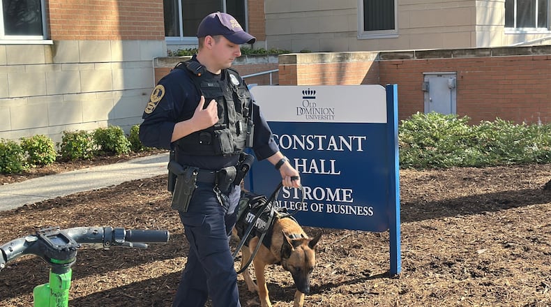 Police are present at Constant Hall, where yesterday shooting occurred on Friday, March 13, 2026 at Old Dominion Universiy in Norfolk, Va. (AP Photo/Allen G. Breed).