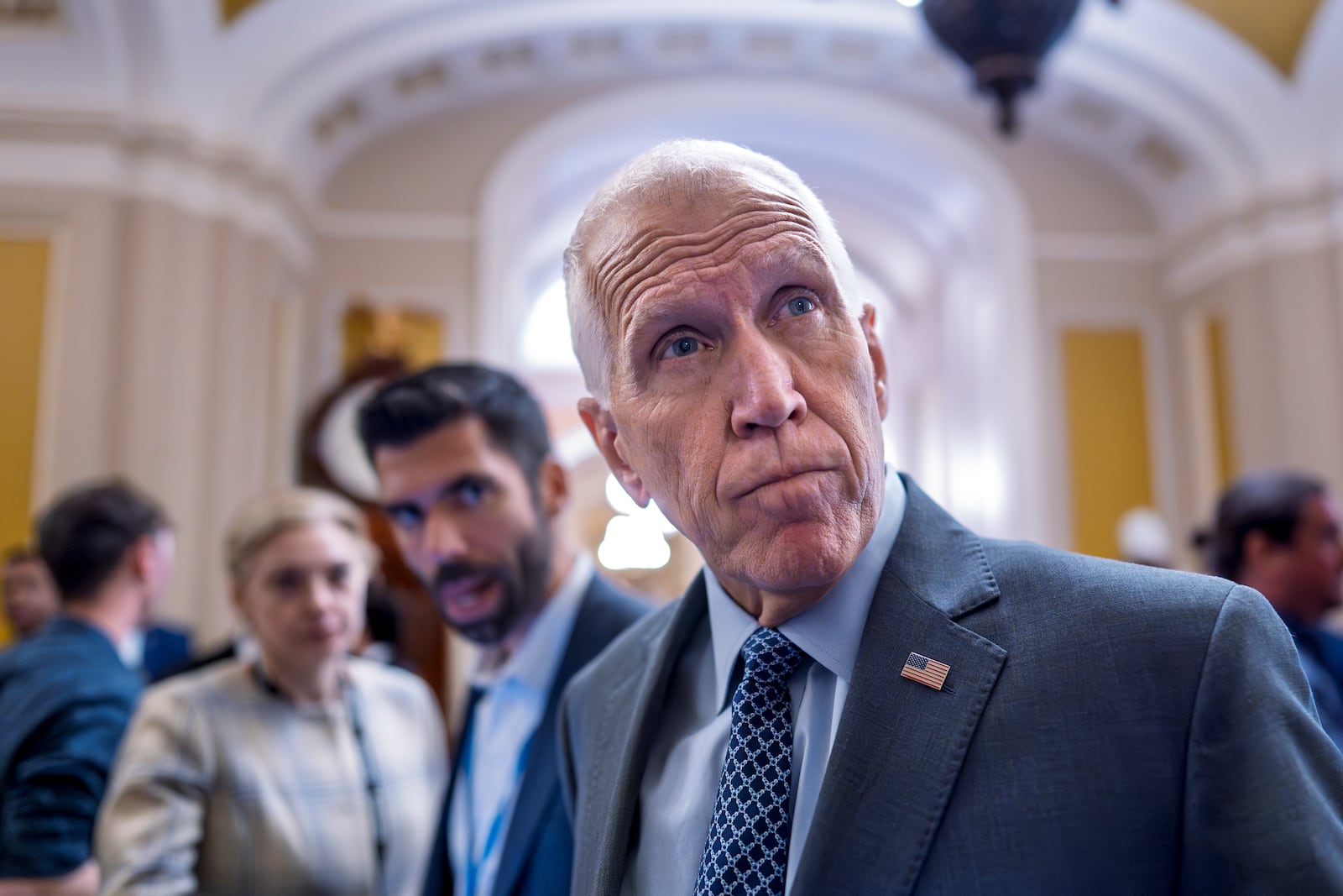Sen. Thom Tillis, R-N.C., a member of the Senate Banking Committee, tells reporters that it would be a mistake for President Donald Trump to fire Federal Reserve Chair Jerome Powell, during a vote in the Senate, at the Capitol in Washington, Wednesday, July 16, 2025. (AP Photo/J. Scott Applewhite)