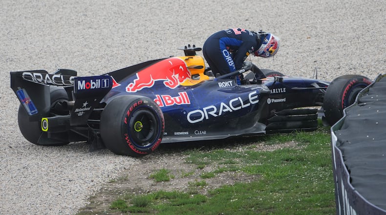 Red Bull driver Max Verstappen of the Netherlands gets out of his car after a crash during the qualifying session for the Australian Formula One Grand Prix at Albert Park, in Melbourne, Australia, Saturday, March 7, 2026. (AP Photo/Asanka Brendon Ratnayake)