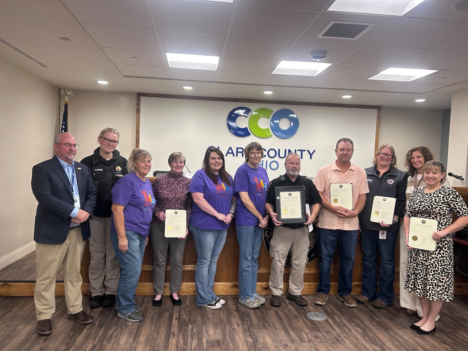Clark County commissioners gave proclamations to the Clark County Dog Shelter and volunteers on Oct. 15 for their service to the dog shelter. From left to right: Officer Gabriella Gaines, Amy Steiger, Jo Anderson, Jessica Martin, Sandra Click, Officer Donald Roberts, Lee McCune, and Michelle Clements-Pitstick. Contributed
