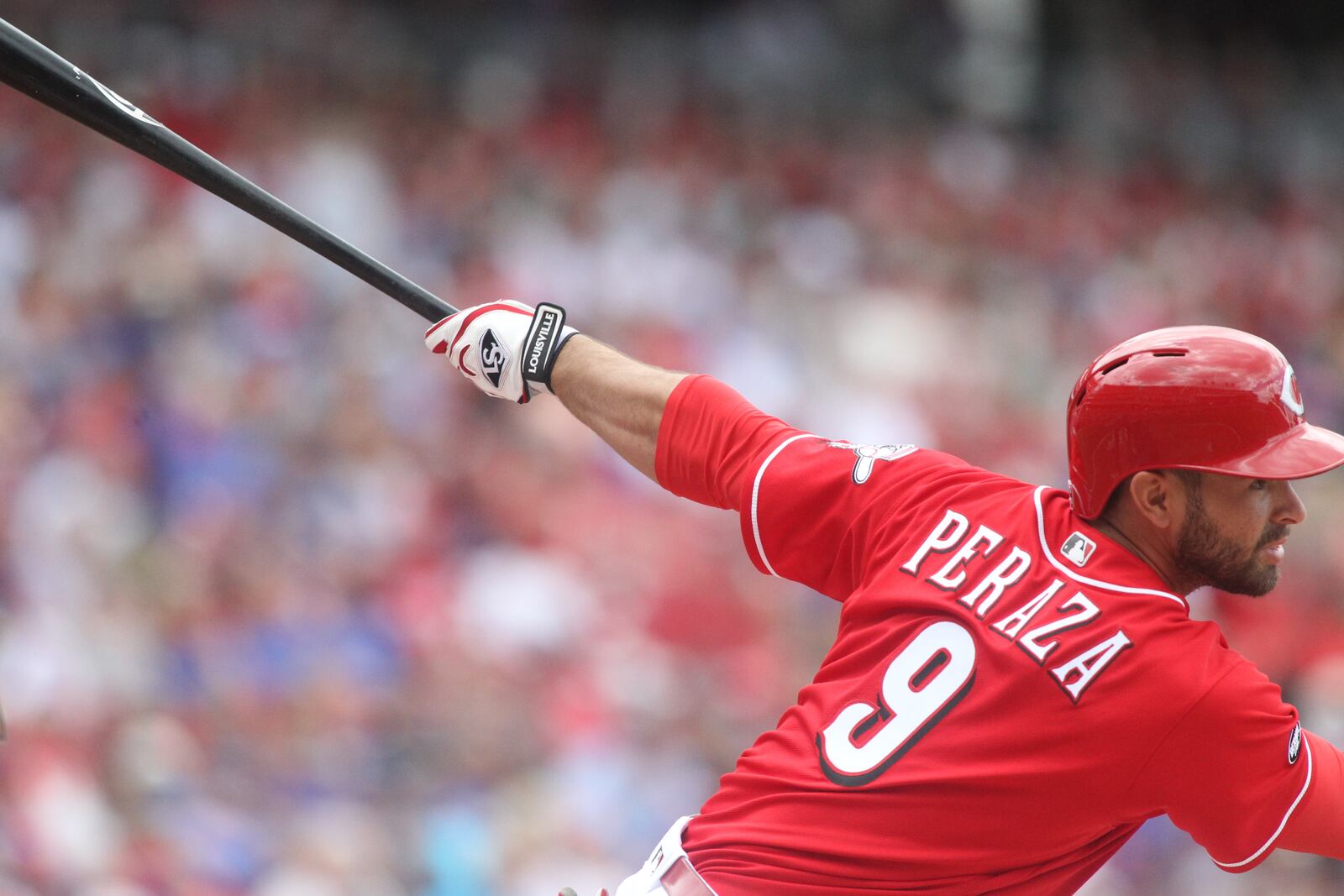 The Reds' Jose Peraza swings against the Cubs on Wednesday, June 29, 2016, at Great American Ball Park in Cincinnati. David Jablonski/Staff