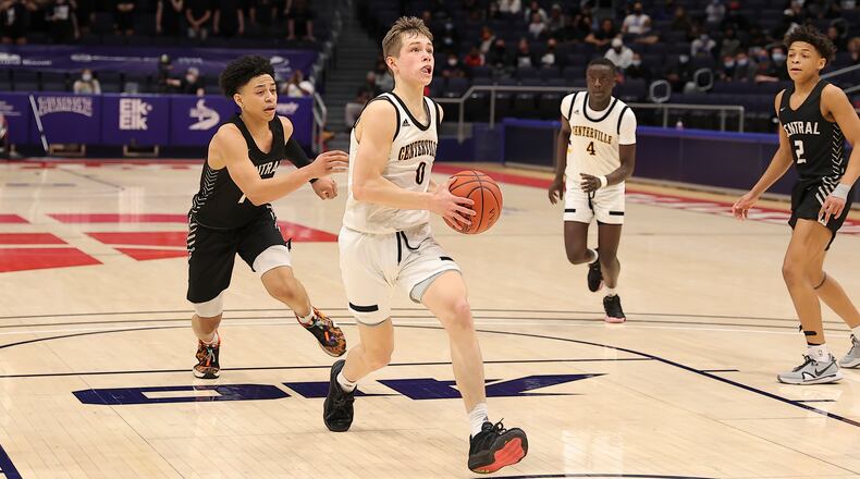Centerville's Gabe Cupps drives the lane during Sunday's Division I state championship game vs. Westerville Central at UD Arena. Michael Cooper/CONTRIBUTED