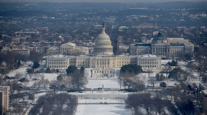 The Capitol is seen after a recent snow storm, Wednesday, Feb., 4, 2026, in Washington. (AP Photo/Rod Lamkey, Jr.)