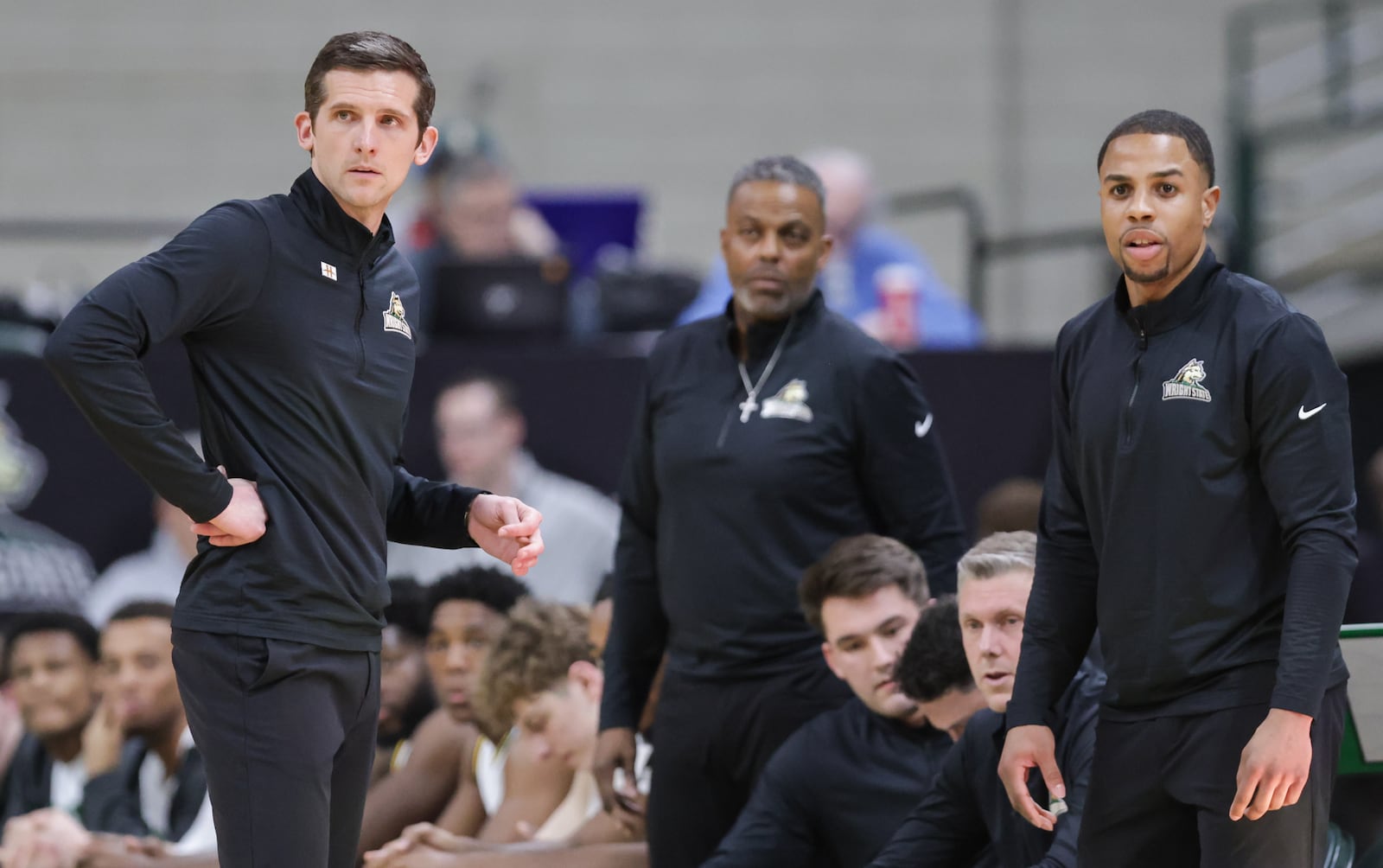 Wright State coach Clint Sargent talks to assistants on the bench during a Horizon League Championship first-round game against Cleveland State on Wednesday, March 4 at Ervin J. Nutter Center in Fairborn. BRYANT BILLING / STAFF