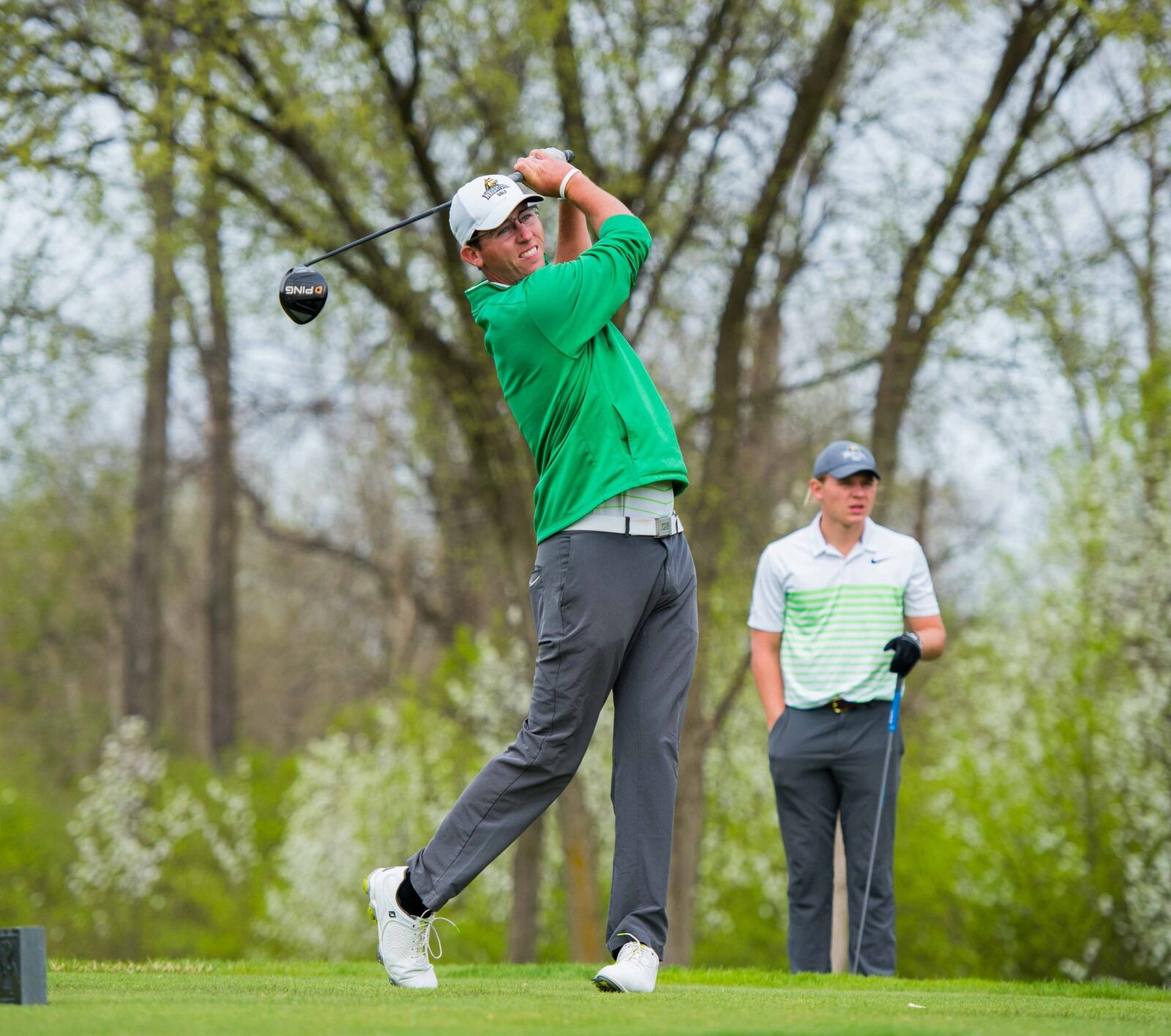 Wright State’s Austin Schoonmaker hits a tee shot during a practice round for the Wright State Invitational last week at Heatherwoode Golf Club in Springboro. Joseph Craven/CONTRIBUTED