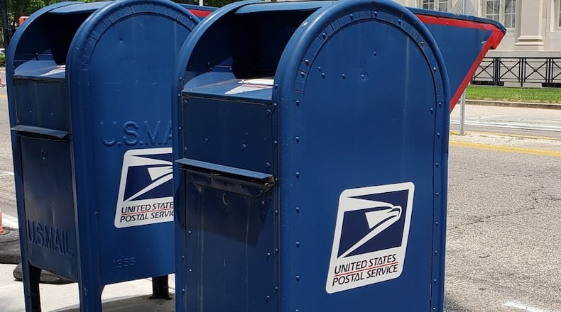 The U.S. Postal Service is replacing tens of thousands of antiquated keys used by postal carriers and installing thousands of high-security collection boxes, seeking to stop a surge of robberies and mail thefts, dozens of which have occurred in the Dayton region. NICK GRAHAM/STAFF FILE