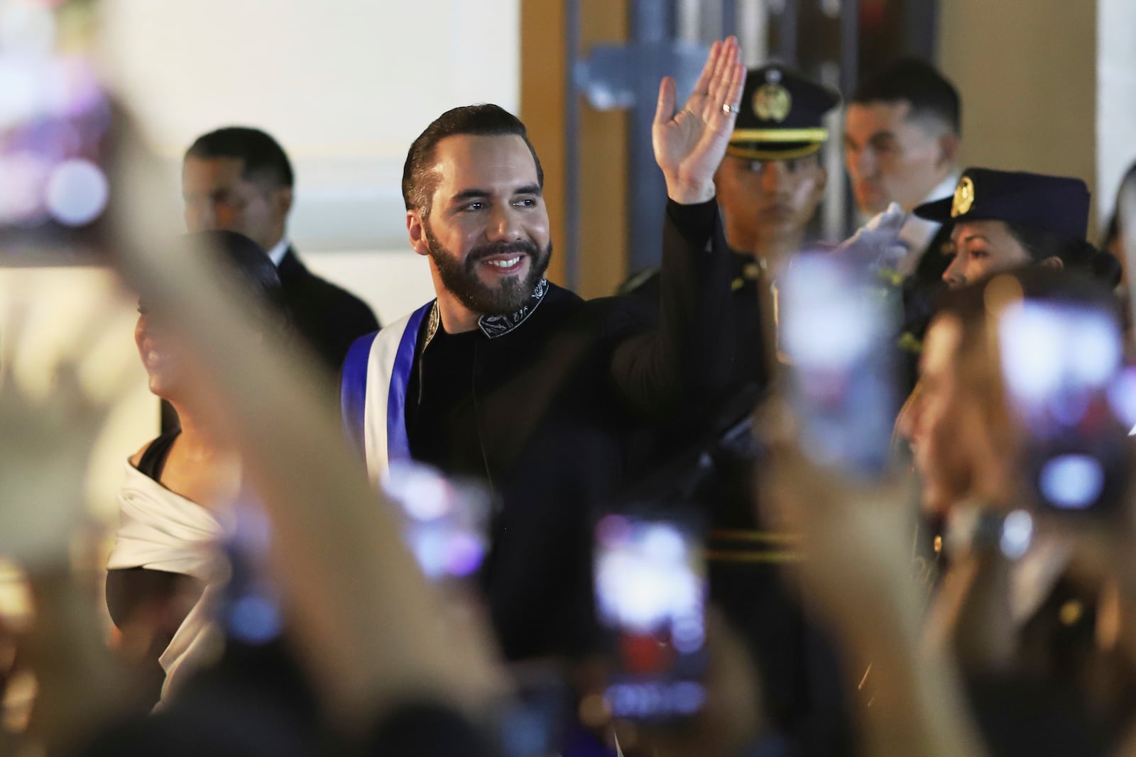 El Salvador's President Nayib Bukele arrives at the National Theater to deliver his annual address to Congress in San Salvador, El Salvador, Sunday, June 1, 2025. (AP Photo/Salvador Melendez)