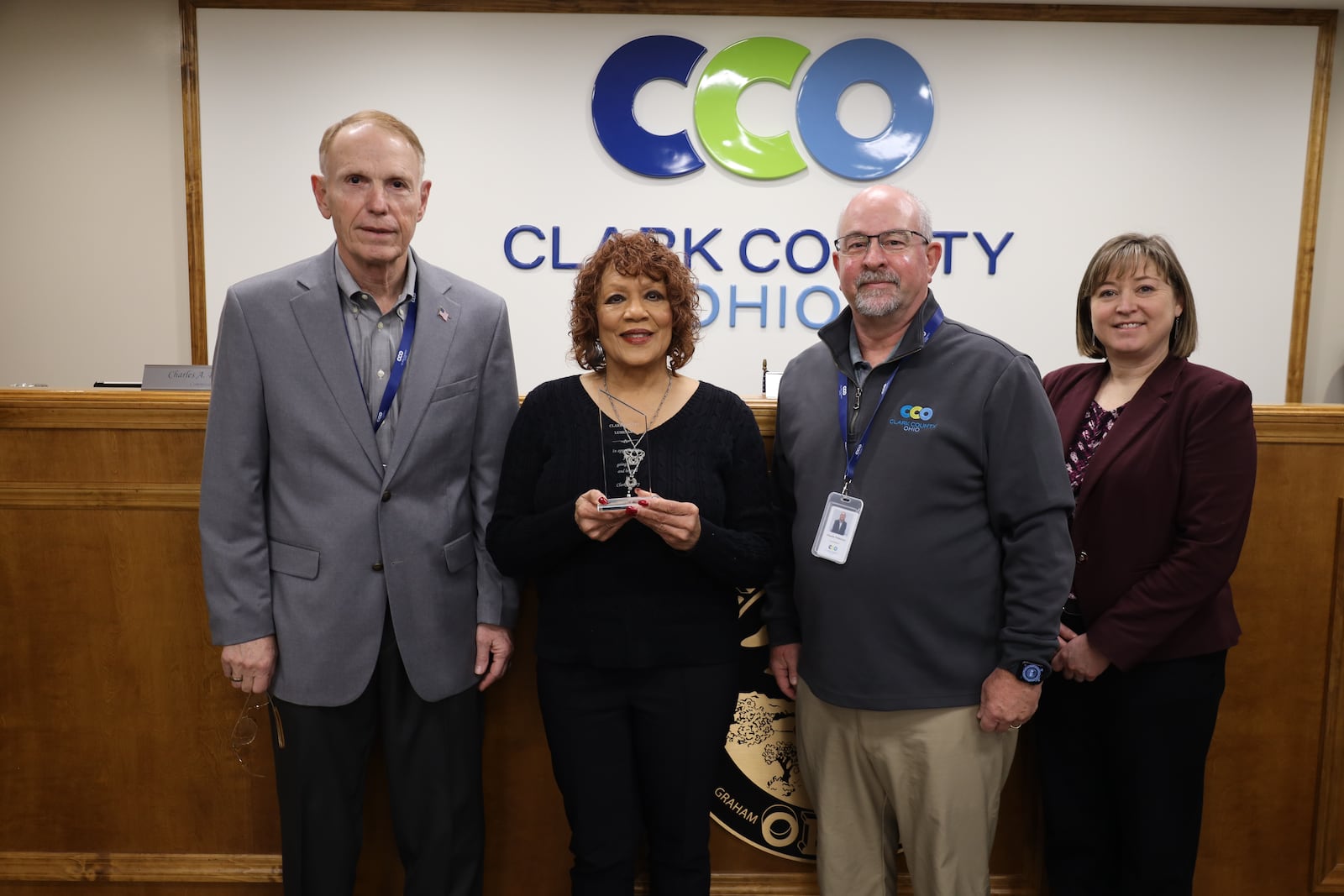 Clark County commissioners recognized three people with Luminary Awards, which celebrates and honors sung and unsung heroes in the community. Charles Patterson (middle, right) honored Deborah Woods (middle left), pictured with acting commissioner Rick Lohnes (left) and President Sasha Rittenhouse (right). Contributed