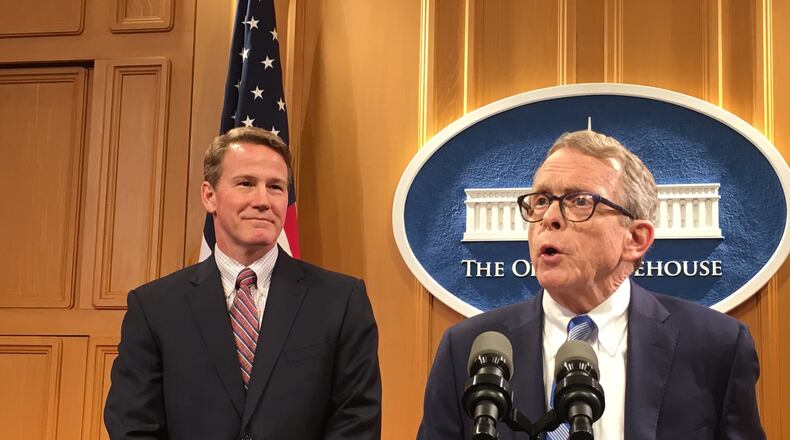 Incoming Gov. Mike DeWine (right) and incoming Lt. Gov. Jon Husted on Tuesday address Husted’s new role. Photo by Laura Bischoff.
