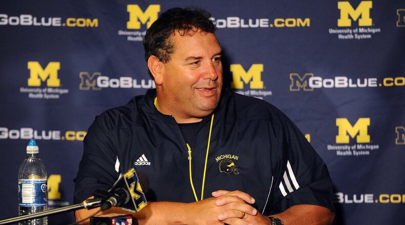 Michigan head football coach Brady Hoke speaks during a news conference following the team’s first NCAA college football practice, Monday, Aug. 8, 2011, in Ann Arbor, Mich. (AP Photo/AnnArbor.com, Melanie Maxwell)