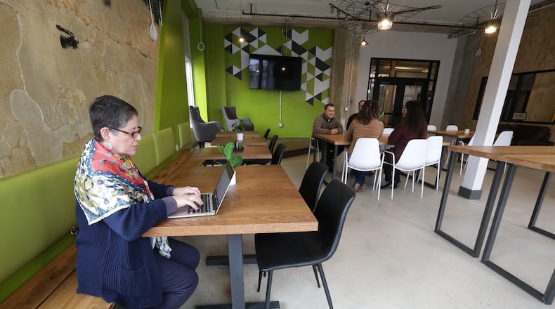 Patrice Watson was taking advantage of the shared working space that opened the first time at the COhatch in Springfield Monday. BILL LACKEY/STAFF