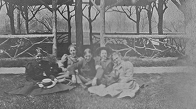 This photo from around 1918 shows a young unidentified Springfield soldier home on leave, enjoying a visit to Snyder Park. He and the four ladies around him are posing in front of the old rustic shelter, one of the earliest structures in the park. PHOTO COURTESY OF THE CLARK COUNTY HISTORICAL SOCIETY