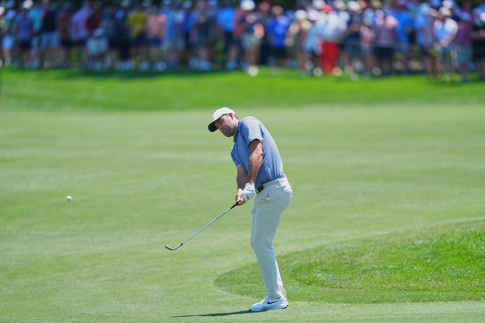 Scottie Scheffler hits onto the sixth green during the final round of the CJ Cup Byron Nelson golf tournament in McKinney, Texas, Sunday, May 4, 2025. (AP Photo/LM Otero)