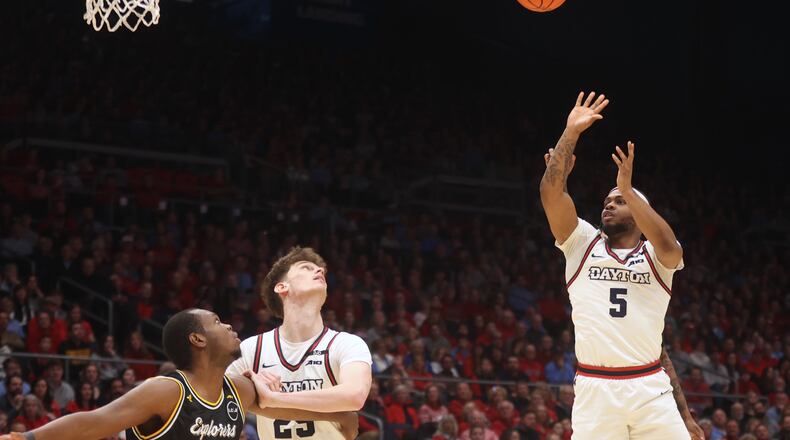 Dayton's Posh Alexander scores against La Salle in the first half on Tuesday, Dec. 31, 2024, at UD Arena. David Jablonski/Staff