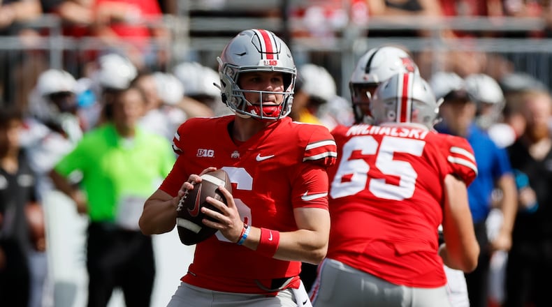 Ohio State quarterback Kyle McCord drops back to pass against Arkansas State during the second half of an NCAA college football game Saturday, Sept. 10, 2022, in Columbus, Ohio. (AP Photo/Jay LaPrete)