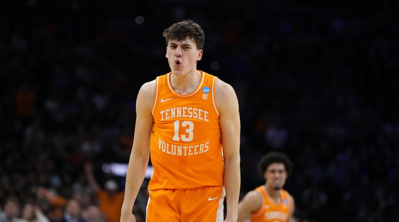 Tennessee's J.P. Estrella reacts after a basket during the second half against Virginia in the second round of the NCAA college basketball tournament, Sunday, March 22, 2026, in Philadelphia. (AP Photo/Matt Slocum)