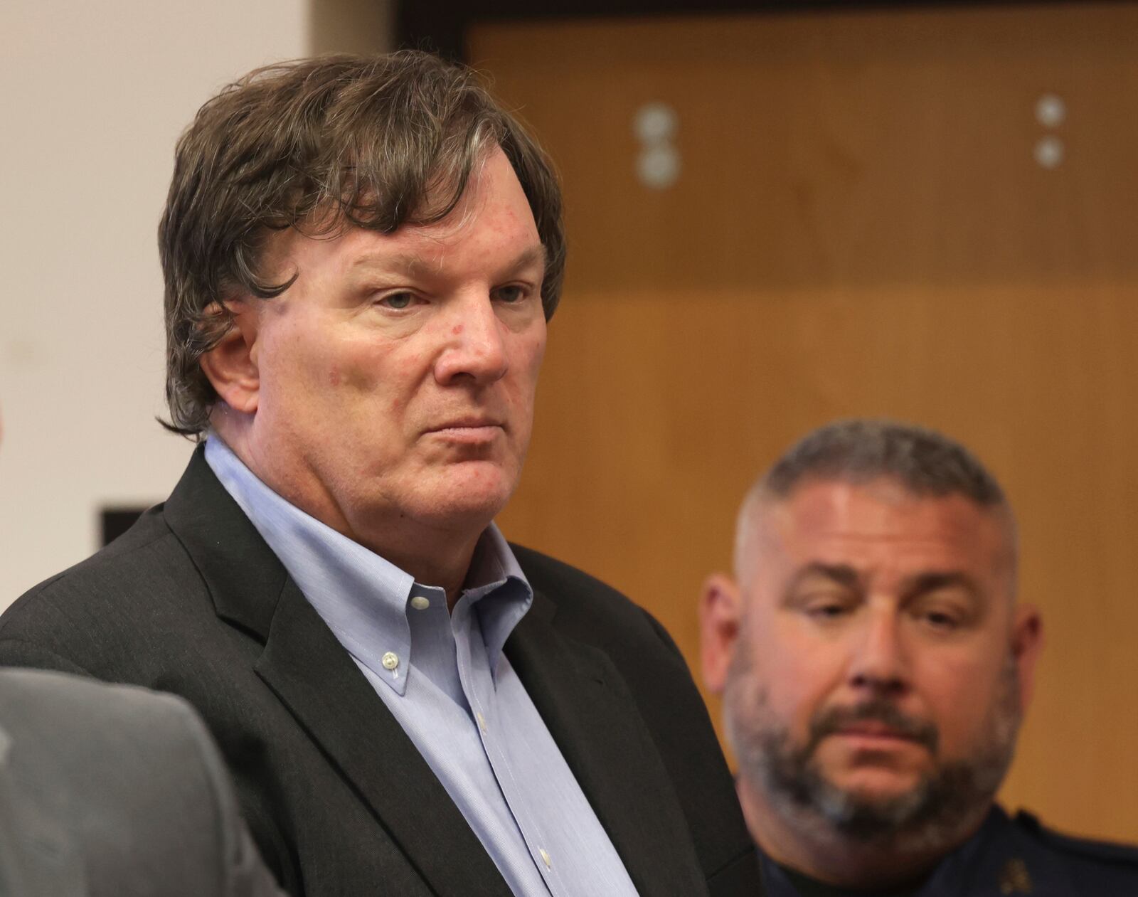 FILE - Rex A. Heuermann, the architect accused of murdering at least three women near Long Island's Gilgo Beach, appears before Judge Timothy P. Mazzei in Suffolk County Court, in Riverhead, N.Y., Aug. 1, 2023. (James Carbone/Newsday via AP, File)