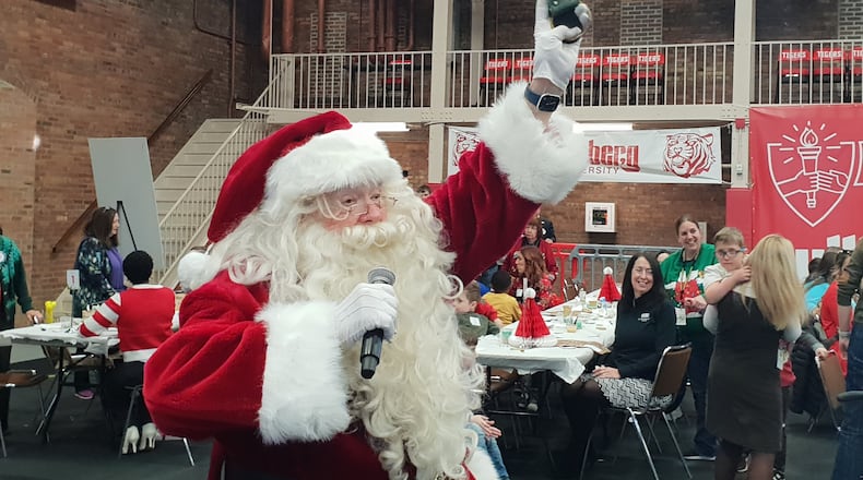 Santa speaks at the Springfield Rotary's 103rd Christmas Party for Children with Disabilities on Monday, Dec. 8, 2025, at at Wittenberg University. CONTRIBUTED
