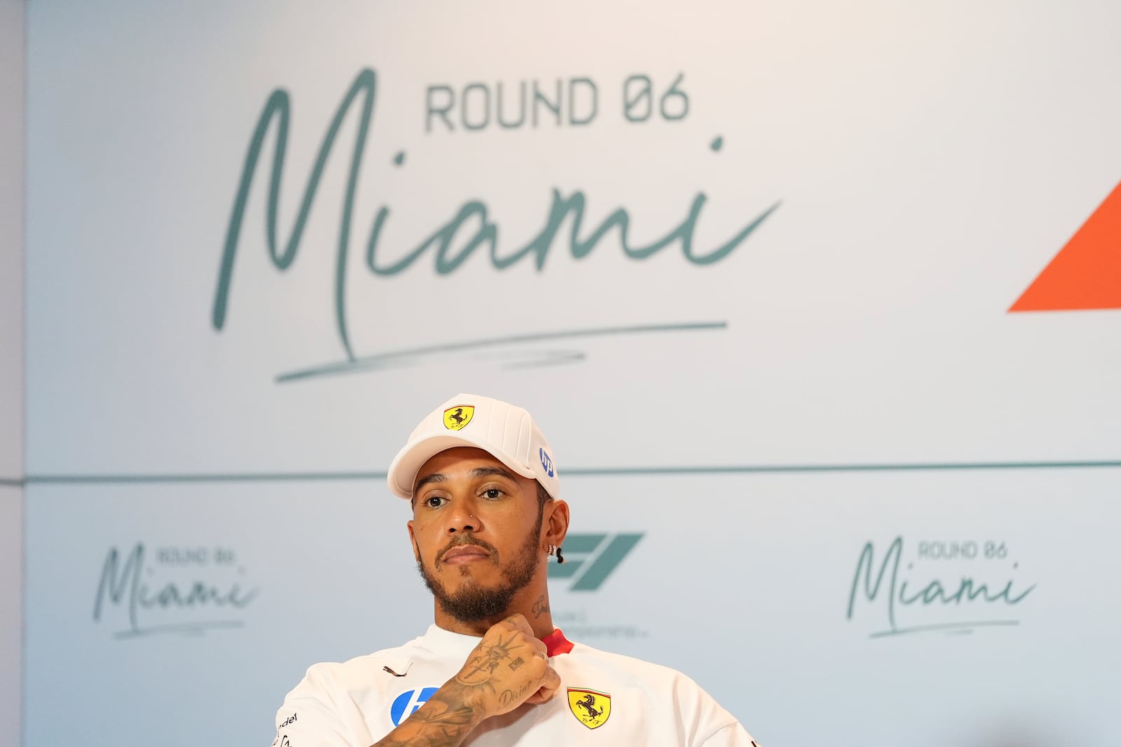 Ferrari driver Lewis Hamilton of Britain participates in a drivers' press conference ahead of the Formula One Miami Grand Prix auto race, Thursday, May 1, 2025, in Miami Gardens, Fla. (AP Photo/Rebecca Blackwell)
