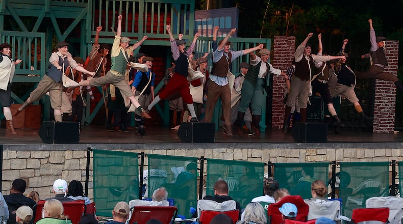 The cast of Disney's Newsies JR. perform a musical number Wednesday, June 14, 2023 during the opening night of the Summer Arts Festival at Veterans Park. The Youth Arts Ambassadors production will also be performed Thursday and Friday. BILL LACKEY/STAFF
