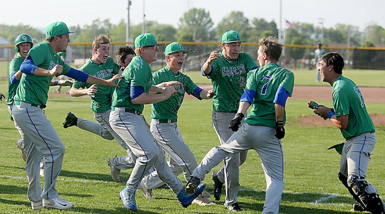 Chaminade Julienne celebrates after Mark Barhorst (7) knocked in the winning run against Badin during a D-II sectional baseball final at Miamisburg. Contributed photo by E.L. Hubbard
