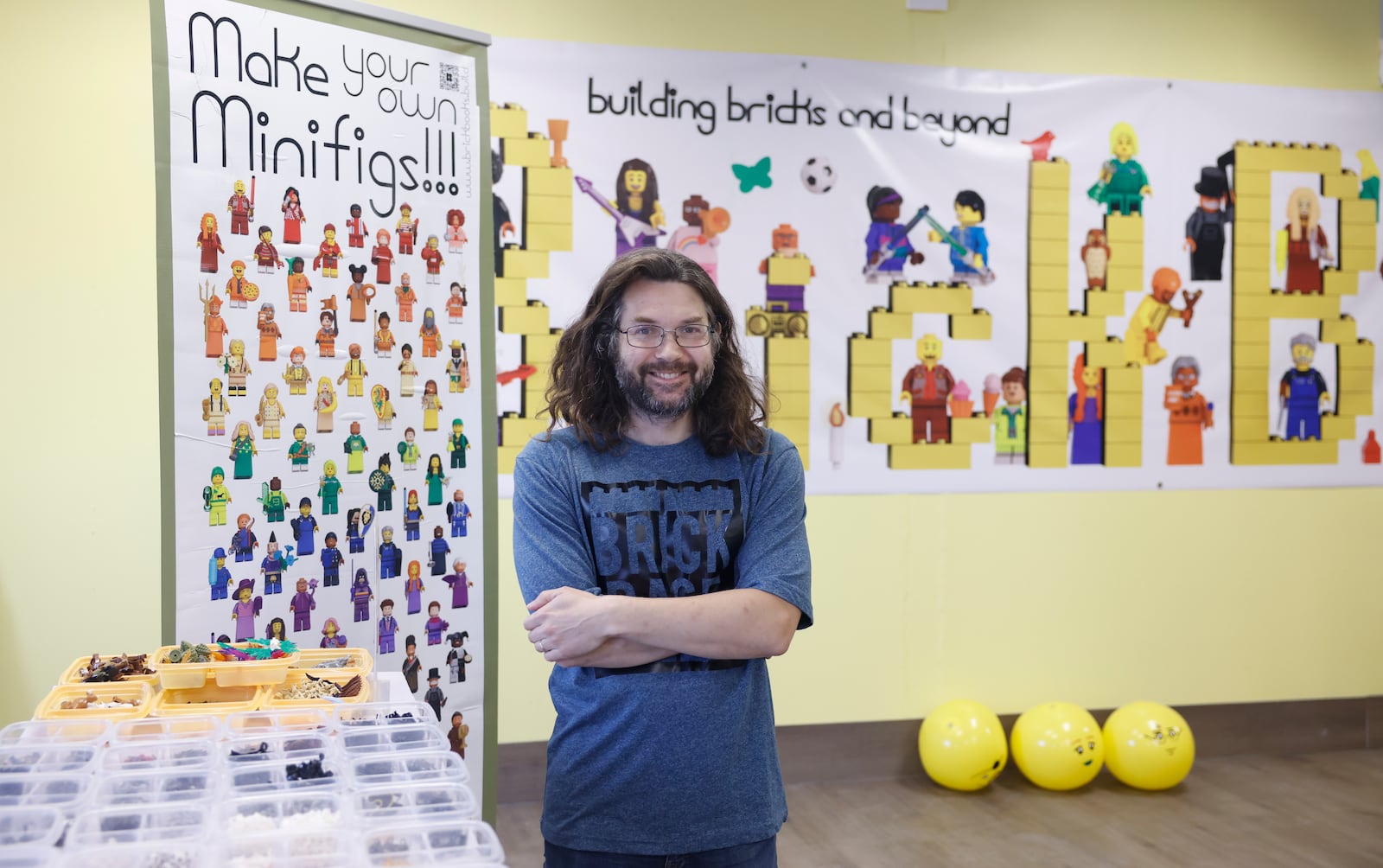 Dan Jacob poses for a portrait in his store on Monday, June 2, 2025, at Brick Base. JOSEPH COOKE/STAFF