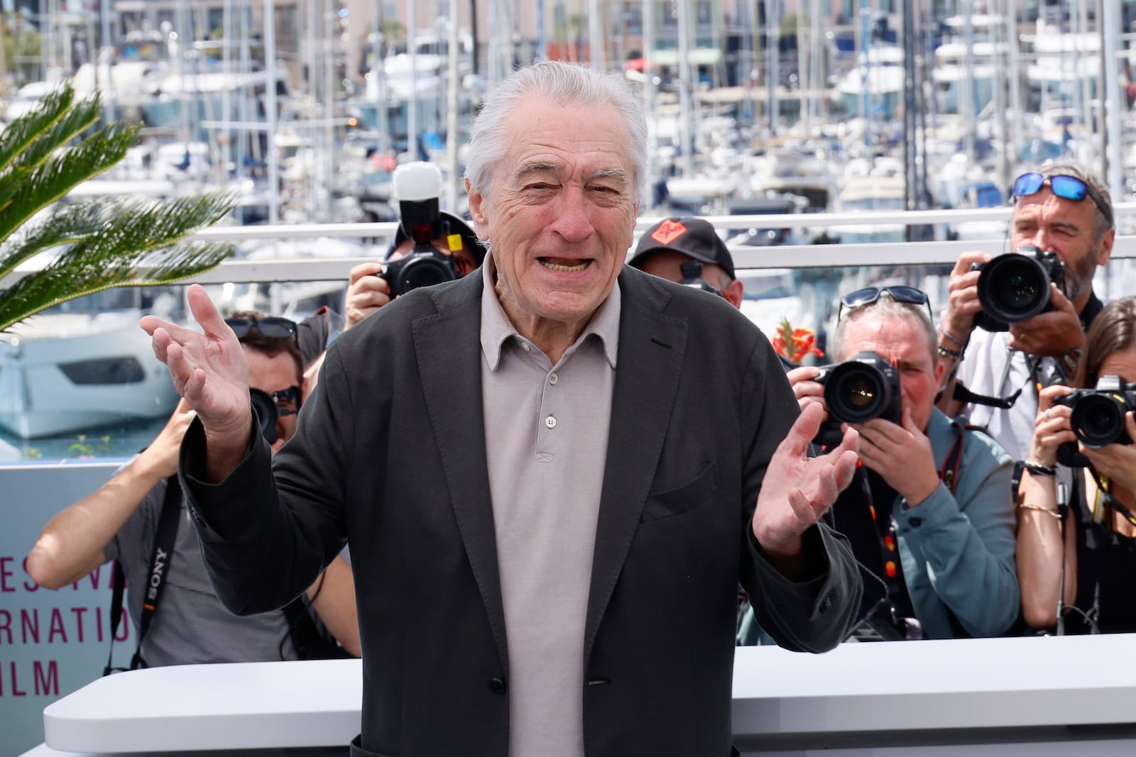 Honorary Palme d'Or recipient Robert De Niro poses for photographers during a photo call at the 78th international film festival, Cannes, southern France, Tuesday, May 13, 2025. (Photo by Joel C Ryan/Invision/AP)