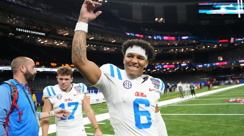 Mississippi quarterback Trinidad Chambliss (6) celebrates after the Sugar Bowl NCAA college football playoff quarterfinal game against Georgia in New Orleans, Thursday, Jan. 1, 2026. (AP Photo/Mathew Hinton)