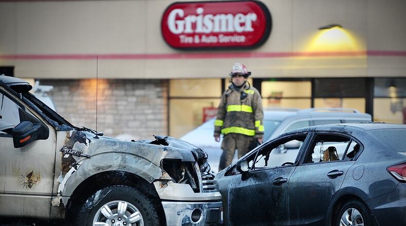 Police and medics responded to a fiery, multi-vehicle crash Tuesday afternoon, Jan. 24, 2023, on Brandt Pike north of Chambersburg Road in Huber Heights involving a white BMW reported stolen out of Clark County. MARSHALL GORBY/STAFF
