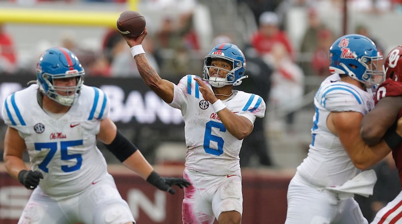 Mississippi quarterback Trinidad Chambliss (6) throws a pass during the first half of an NCAA college football game against Oklahoma in Norman, Okla., Saturday, Oct. 25, 2025. (AP Photo/Alonzo Adams)
