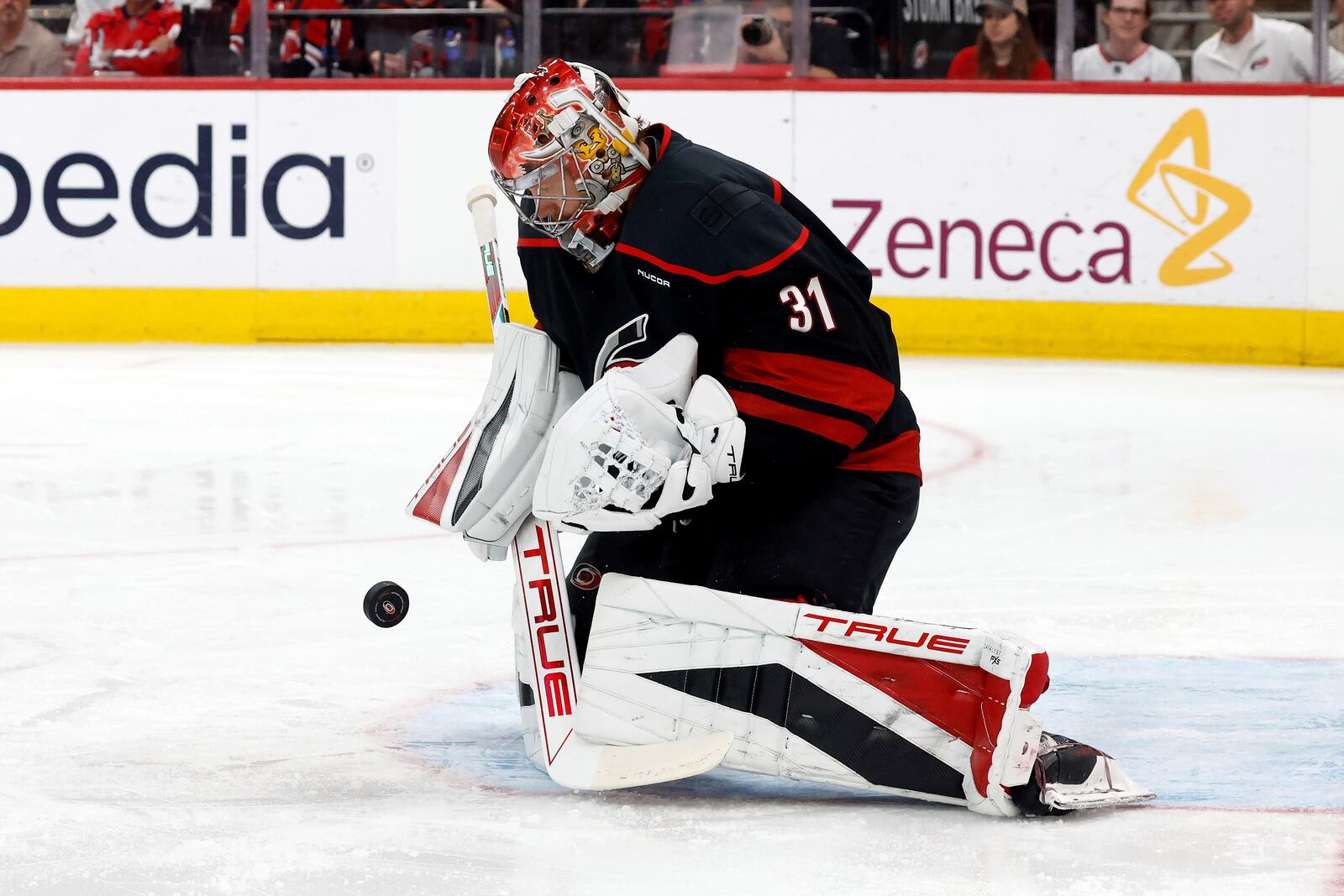 Carolina Hurricanes goaltender Frederik Andersen blocks a shot by the Washington Capitals during the first period of Game 4 of a second-round NHL hockey playoff series in Raleigh, N.C., Monday, May 12, 2025. (AP Photo/Karl DeBlaker)
