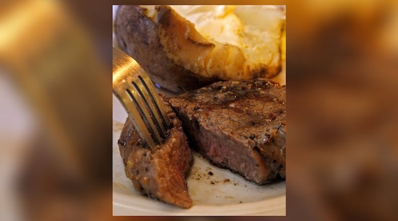 A juicy sirloin cooked to order at The Cattle Zone Restaurant and Bar. Bill Lackey/Staff