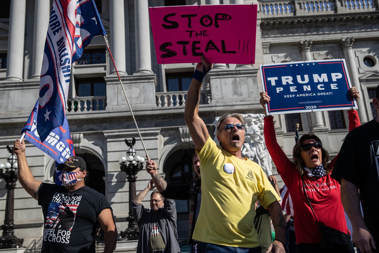 Supporters of President Donald Trump rally outside the Pennsylvania State Capitol in Harrisburg, Pa., on Saturday, Nov. 7, 2020, after it was announced that Joe Biden was elected the 46th president of the United States. President-elect Biden achieved victory offering a message of healing and unity. He will return to Washington facing a daunting set of crises. (Victor J. Blue/The New York Times)