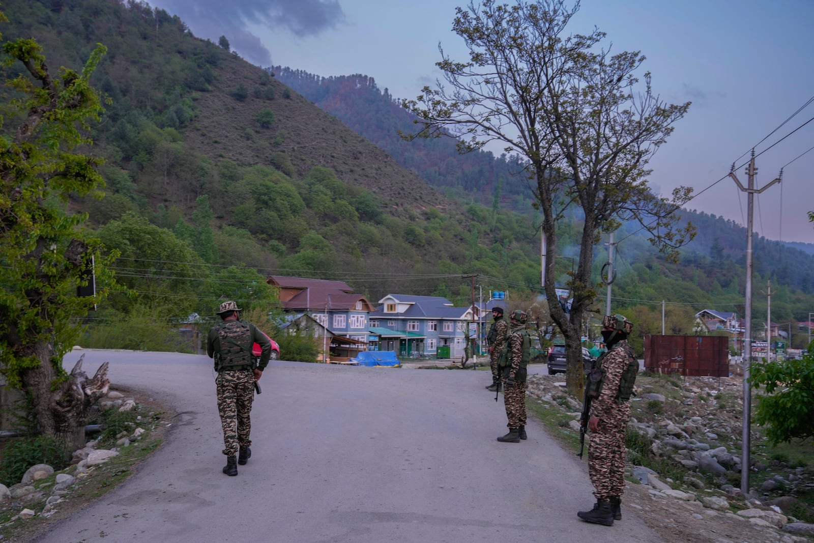 Indian security personnel stand guard in south Kashmir after assailants indiscriminately opened fired at tourists in Pahalgam, Indian controlled Kashmir, Tuesday, April 22, 2025. (AP Photo/Dar Yasin)