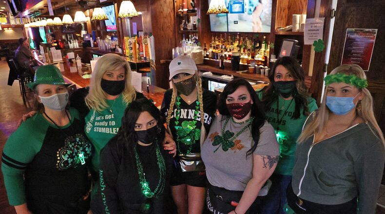 The staff at O'Conner's Irish Pub last year was showing the St. Patrick's Day spirit. BILL LACKEY/STAFF