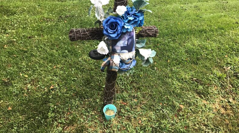 This is a memorial for James Mundy. He was shot and killed at Josephine and Rice Streets in June 2015.