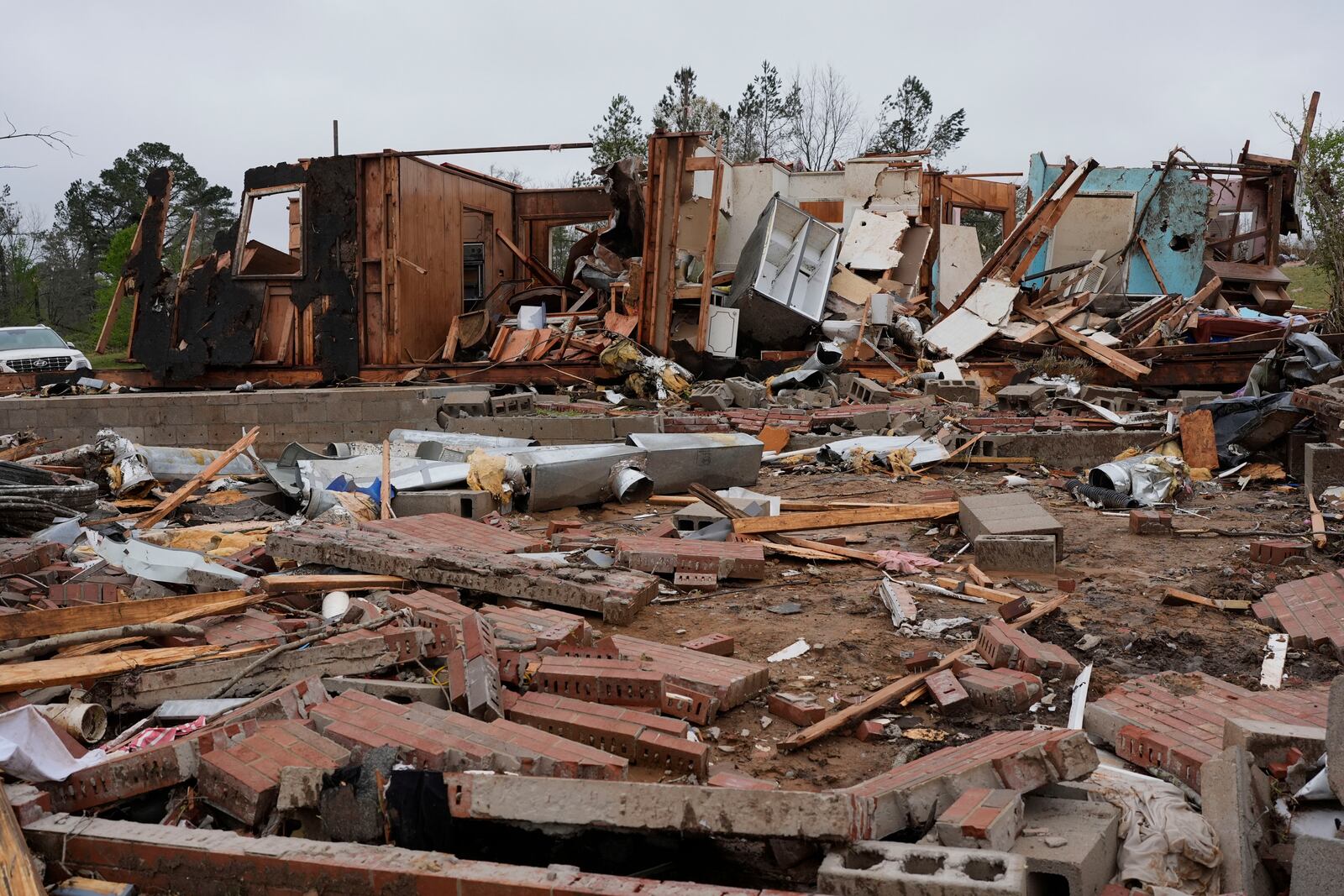 A home is destroyed following severe weather in Selmer, Tenn., Thursday, April 3, 2025. (AP Photo/George Walker IV)