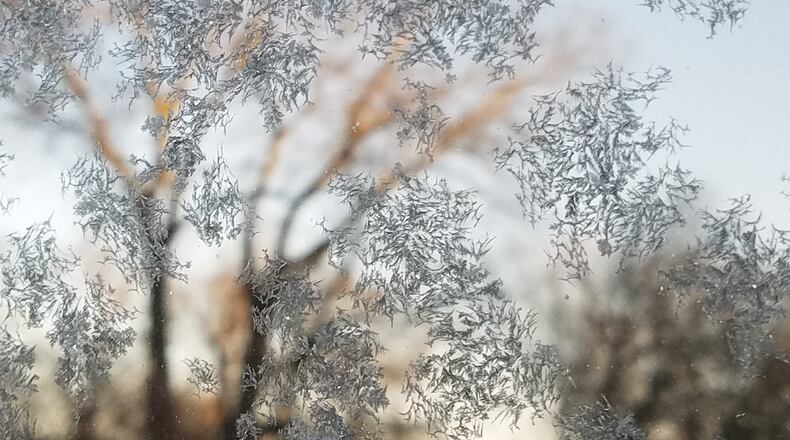 Candie Takacs of Kettering took photo on March 4, a frosty morning at her home in Kettering. She says, “The ice crystals were on my husband's truck window, so beautiful! The soft brown color on one side of the photo is a mirrored reflection of trees in our backyard.”