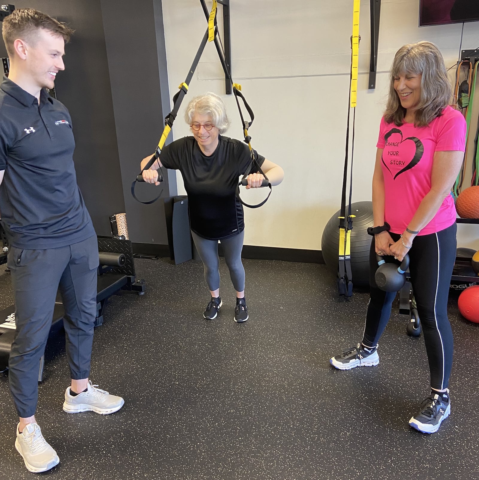 Trainer Chase Meade (left) started Becky Cohran (middle) and Jackie Rusek Zofkie with smaller weights and let them build strength slowly after their injuries. CONTRIBUTED