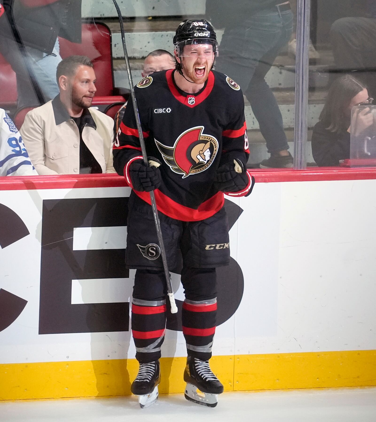 Ottawa Senators' Jake Sanderson (85) celebrates after his winning goal against the Toronto Maple Leafs in overtime of Game 4 of an NHL hockey Stanley Cup first-round playoff series in Ottawa, Ontario, Saturday, April 26, 2025. (Adrian Wyld/The Canadian Press via AP)