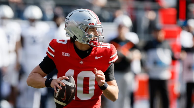 Ohio State quarterback Julian Sayin drops back to pass against Penn State during the first half of an NCAA college football game, Saturday, Nov. 1, 2025, in Columbus, Ohio. (AP Photo/Jay LaPrete)
